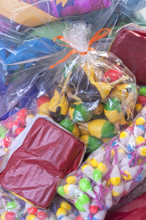 Pile of variety of colorful packaged Mexican firecrackersの写真素材