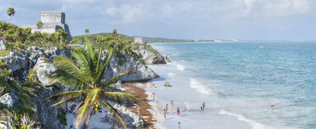 TULUM, MEXICO - JANUARY 23, 2015: The Maya ruins of Tulum are situated on top of limestone cliffs overlooking a beautiful sandy beach and the Caribbean Sea and are the third most visited archaeological site of Mexicoのeditorial素材
