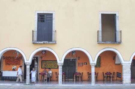 VALLADOLID, MEXICO - JANUARY 20, 2015: Columns and arches form the patio of La Cantina restaurant in Valladolid, Mexico, a colonial style restaurant in the center of the townのeditorial素材