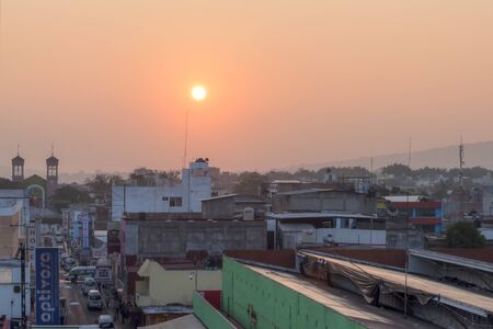 TUXTLA GUTIERREZ, MEXICO - FEBRUARY 11, 2015: The early morning sun glows over the marketplace and downtown area of Tuxtla Gutierrez in Chiapas, Mexicoのeditorial素材