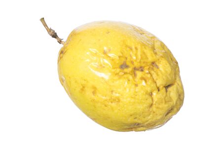 Closeup whole yellow maracuja Passiflora edulis var. flavicarpa passion fruit isolated on white backgroundの写真素材