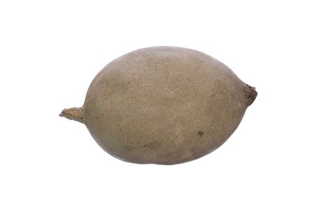 Closeup whole Genipa americana jenipapo fruit isolated on white backgroundの写真素材