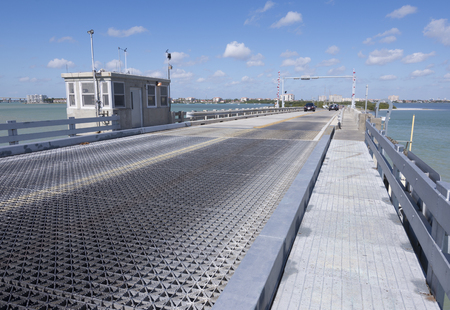 ST. PETERSBURG, FLORIDA, USA - FEBRUARY 25, 2016: The bridge tender's house sits at the top of the arch of the Tierra Verde drawbridge constructed in 1962 as a connection between Tierra Verde island and the mainland of St. Petersburg.のeditorial素材