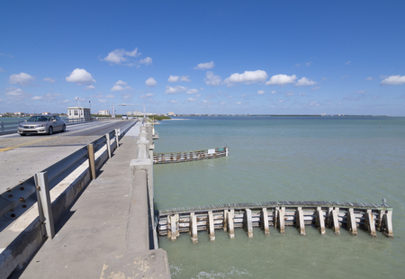 ST. PETERSBURG, FLORIDA, USA - FEBRUARY 25, 2016: The Tierra Verde bridge constructed in 1962 as a connection between Tierra Verde island and the mainland of St. Petersburg used to collect tolls but now only serves as a dreawbridge.のeditorial素材