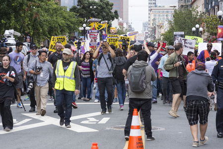 SAN DIEGO, USA - MAY 27, 2016: The Trump rally in San Diego was met by a huge opposition crowd that marched the streets of downtown to meet Trump supporters outside the convention center.のeditorial素材