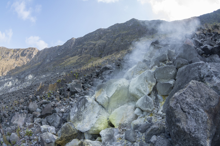 Hot sulfuric gases escape from vent inside crater of El Chichonal volcano in Chiapas, Mexicoの写真素材