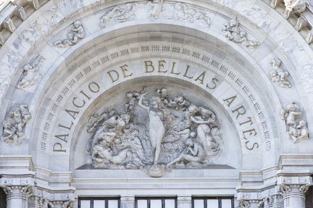 MEXICO CITY, MEXICO - APRIL 19, 2017: Intricate sculptures compliment the name Palacio de Bellas Artes of neoclassical architectural style of this cultural center in Mexico City.のeditorial素材