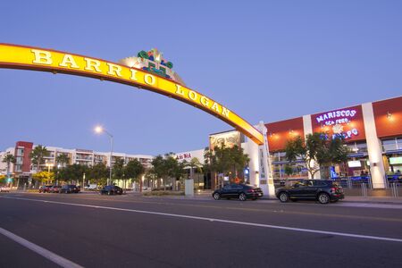 SAN DIEGO, CALIFORNIA, USA - OCTOBER 4, 2017: A wide arching sign over Cesar Chavez Parkway welcomes visitors to the predominantly Latino community of Barrio Logan in San Diego.のeditorial素材