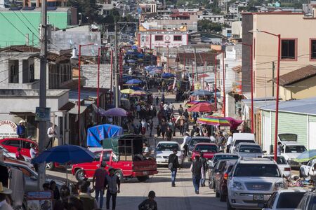SAN JUAN CHAMULA, CHIAPAS, MEXICO - JUNE 23, 2018: The main avenue in downtown San Juan Chamula becomes a crowded marketplace on weekends.のeditorial素材