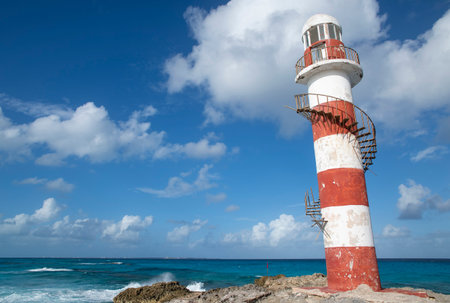 Broken staircase spirals around Punta Cancun lighthouse in Cancun, Mexicoの写真素材