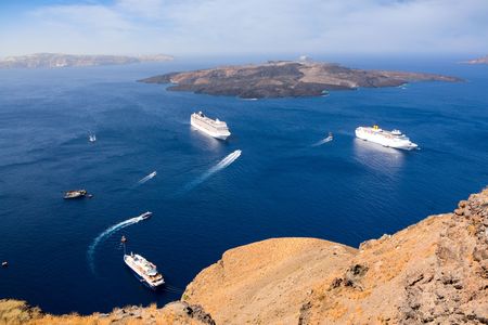 Cruise ships and spectacular caldera view at Santorini, Greeceの写真素材