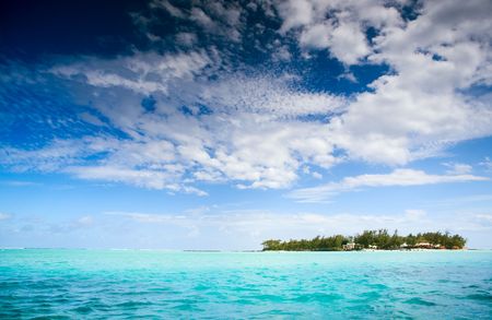 Small tropical island, turquoise ocean, blue skyの写真素材
