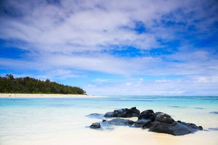 Tropical paradise. White sand beach, turquoise ocean and blue sky.の写真素材