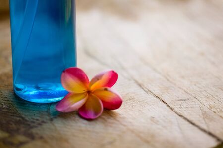 Blurred background with pink frangipaniの写真素材