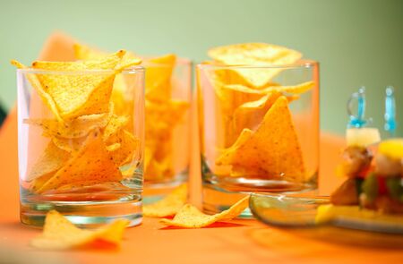 Crispy corn chips in glassの写真素材