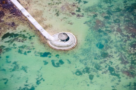 Above view of long jetty in tropical waters of Indian oceanの写真素材