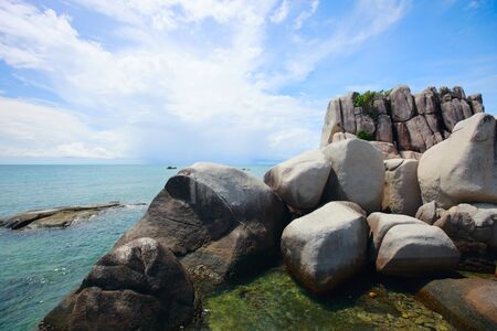 Landscape of beautiful rocky coast in Indonesiaの写真素材