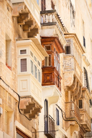Traditional closed wooden balconies of Valletta city in Malta, Europe. UNESCO World Heritage Site.の写真素材