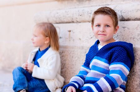 Portrait of two adorable kids outdoorsの写真素材