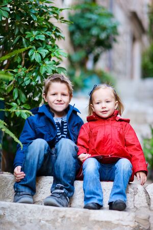 Brother and sister at narrow street in Dubrovnik Croatiaの写真素材