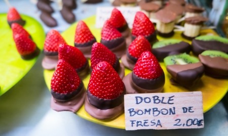 Fresh fruits dipped in dark and milk chocolate