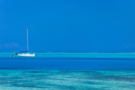 White yacht at stunning tropical lagoon of Bora Boraの写真素材