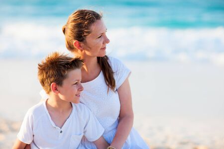 Mother and son portrait on beach vacationの写真素材
