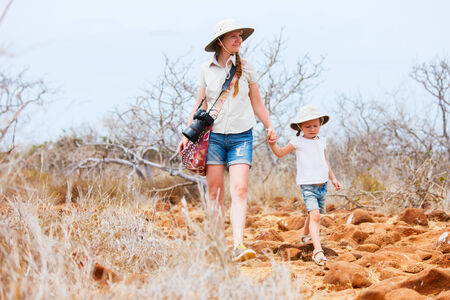 Mother and daughter hiking at North Seymour, Galapagos islands, Ecuadorの写真素材
