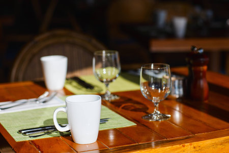 Table set for breakfast at cozy restaurant