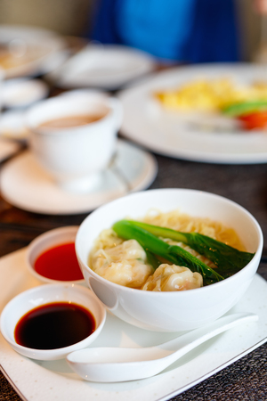 Delicious Chinese cuisine wonton dumplings served at restaurantの写真素材