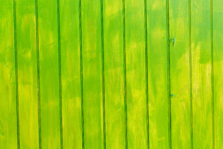 Aged painted wooden texture background of vivid green colorの写真素材