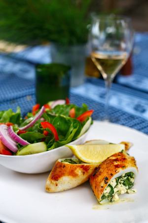 Close up of delicious grilled seafood stuffed calamariの写真素材