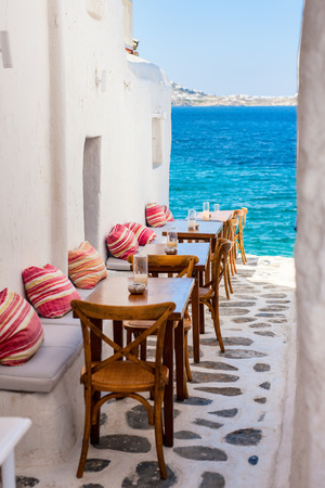 Typical greek traditional village with white walls and colorful doors on Mykonos Island, Greece, Europeの写真素材