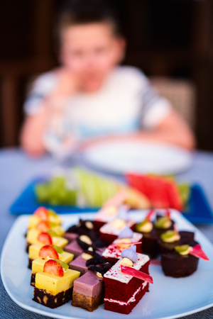 Many delicious desserts on a plateの写真素材