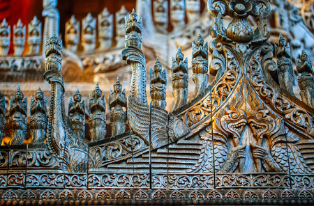 Wooden carvings of historic Shwenandaw Buddhist monastery located in Mandalay Myanmarの写真素材