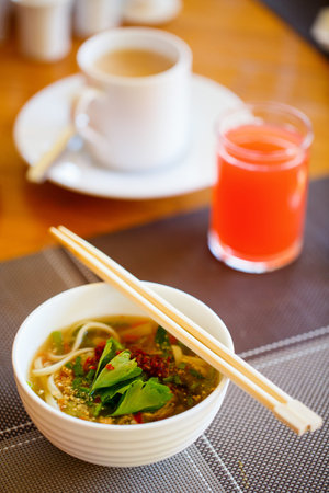 Delicious Asian noodle and meat dish served for breakfast or lunch