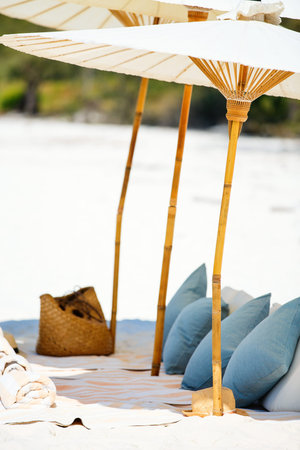 Luxury picnic on beautiful white sand exotic beach on Koh Rong island in Cambodiaの写真素材