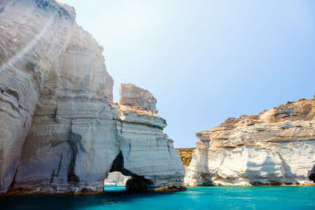 Rock formations and sea caves at Kleftiko shoreline in Milos Greeceの写真素材