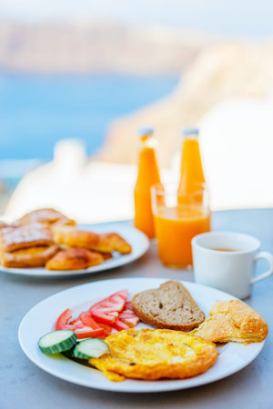 Delicious breakfast with omelet and vegetables