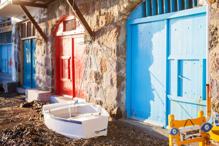 Colorful fishing village of Klima with white houses and colorful doors on Milos Island in Greece