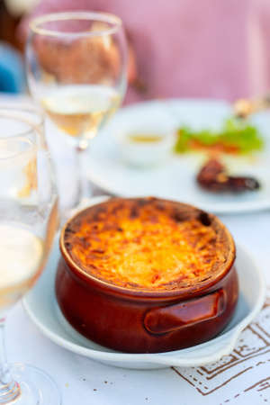 Traditional greek moussaka dish served for lunch or dinner in restaurantの写真素材