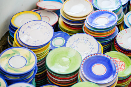 Colorful small dishes in ceramic factory in Italy