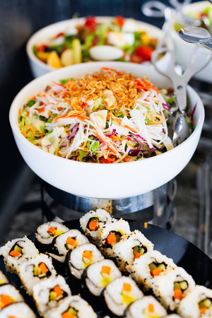 Selection of delicious fresh food served for breakfast at salad station