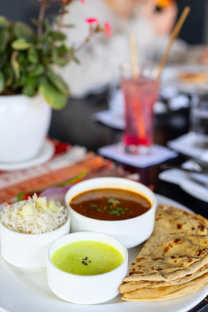 Flavours of India - freshly made roti paratha served with assorted indian curry