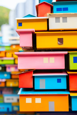 A vibrant arrangement of miniature, colorful house models resembling the iconic architecture of Gamcheon Culture Village in Busan, South Korea.の写真素材