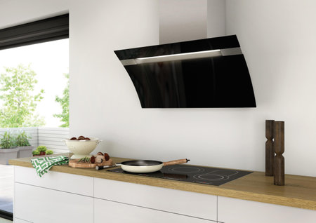 Modern black kitchen hood on a kitchenの写真素材