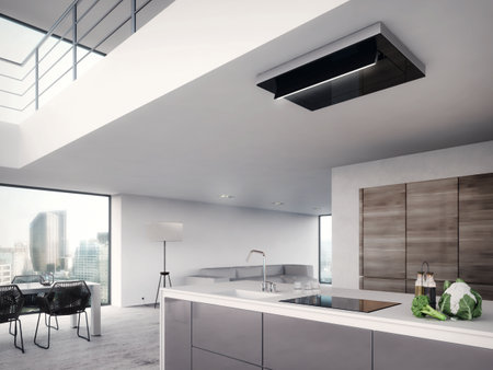 Black ceiling range hood in a modern kitchenの写真素材