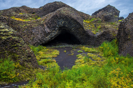 Cave Kirkjan of hexagonal basalt rosettes in Icelandの写真素材