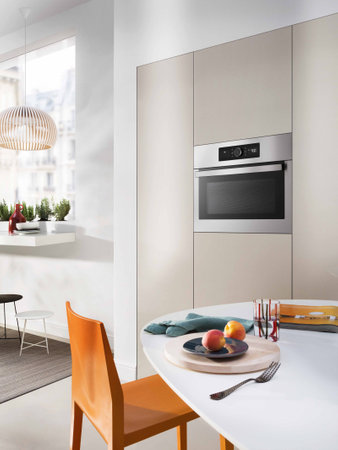Modern electric built-in microwave oven in kitchen furnitureの写真素材