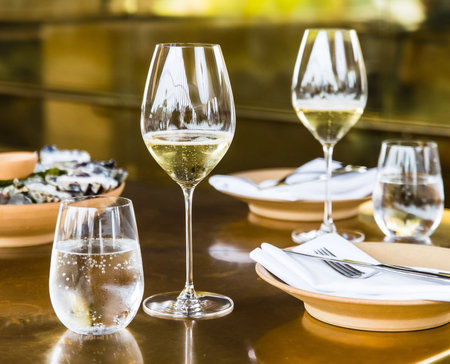 Champagne glasses on a tableの写真素材